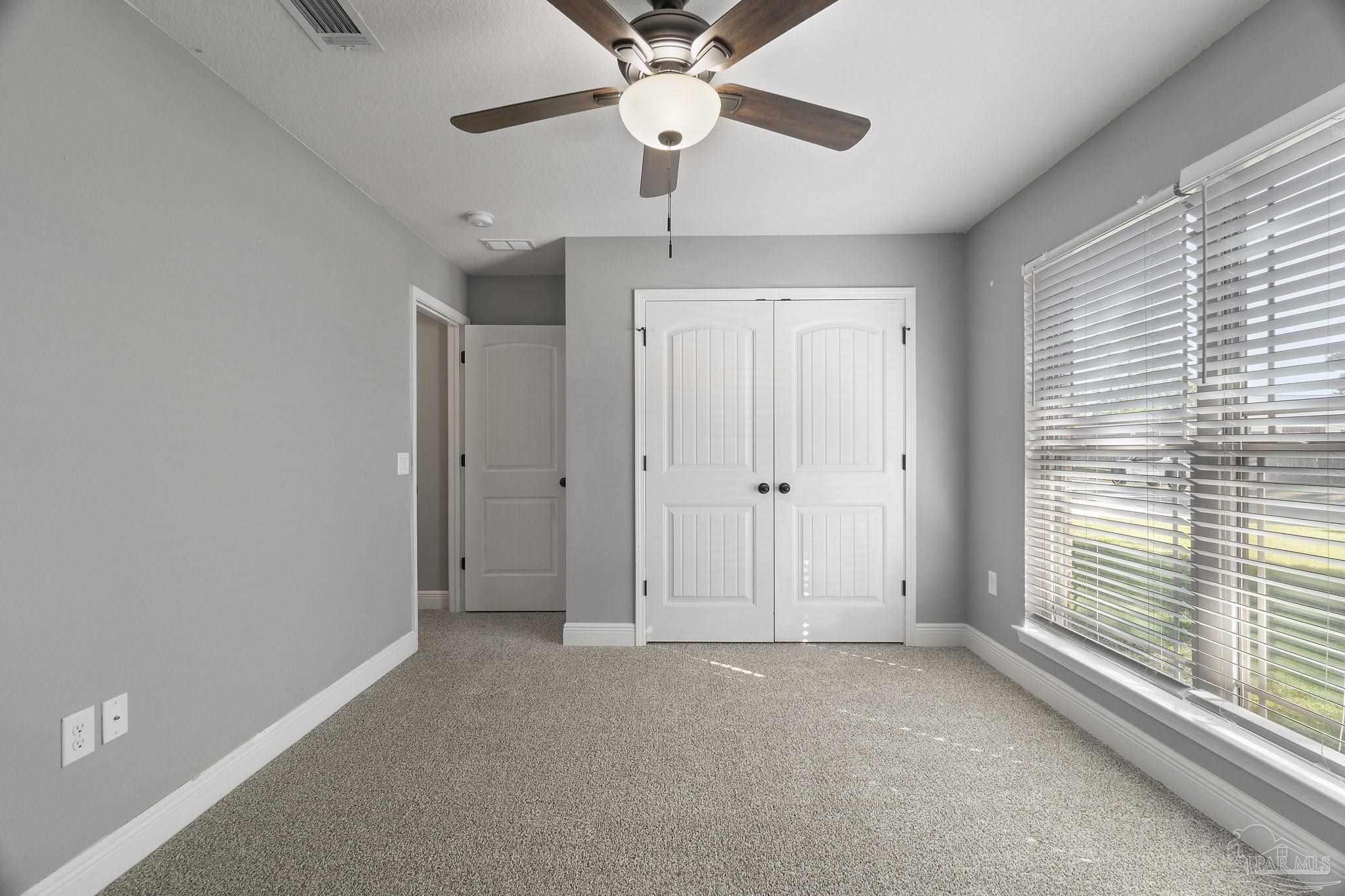 5607 Cane Syrup Circle Pace, FL 32571 - Photo 34 of 54 a view of empty room with ceiling fan
