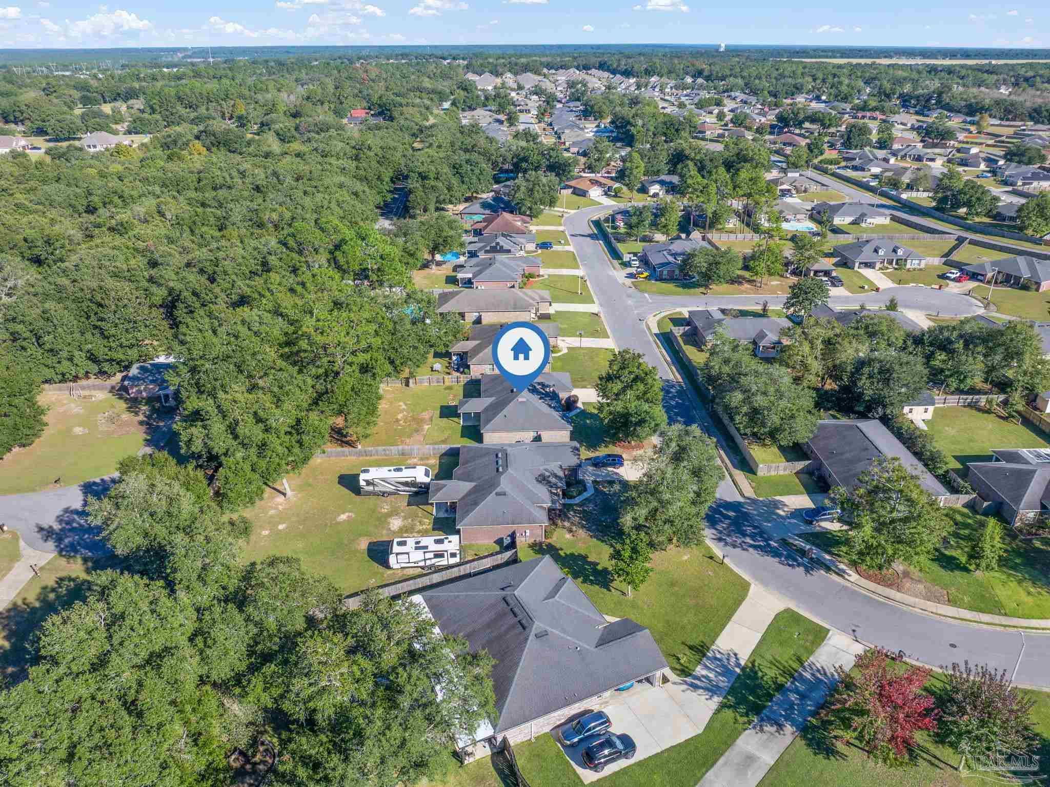 5607 Cane Syrup Circle Pace, FL 32571 - Photo 51 of 54 an aerial view of residential houses with outdoor space