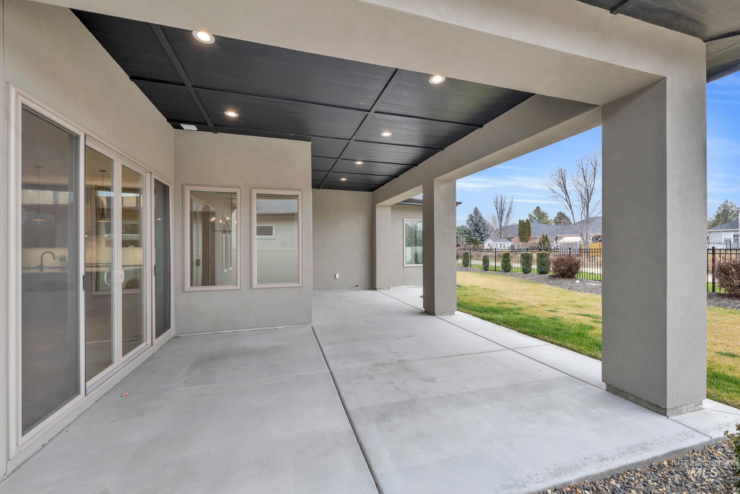4447 East Copper Point Drive Meridian, ID 83642 - Photo 33 of 41 View of patio with a residential view