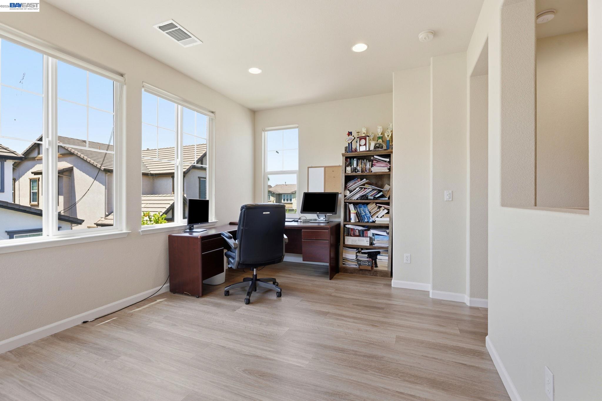 5029 Queensbury Way San Ramon, CA 94582 - Photo 17 of 58 a view of a workspace with furniture and a window