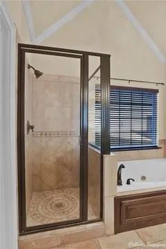 2805 Clearbrook Way Haughton, LA 71037 - Photo 18 of 33 a bathroom with a bathtub and a shower