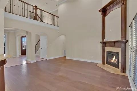 2805 Clearbrook Way Haughton, LA 71037 - Photo 8 of 33 a view of a livingroom with wooden floor and a fireplace