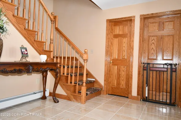a kitchen with stainless steel appliances granite countertop a stove and a refrigerator