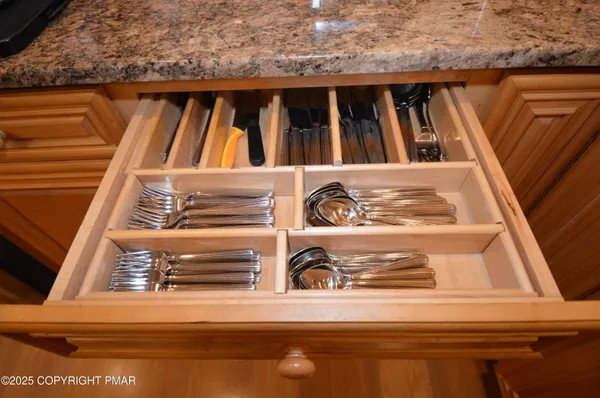 a view of entryway livingroom and hall