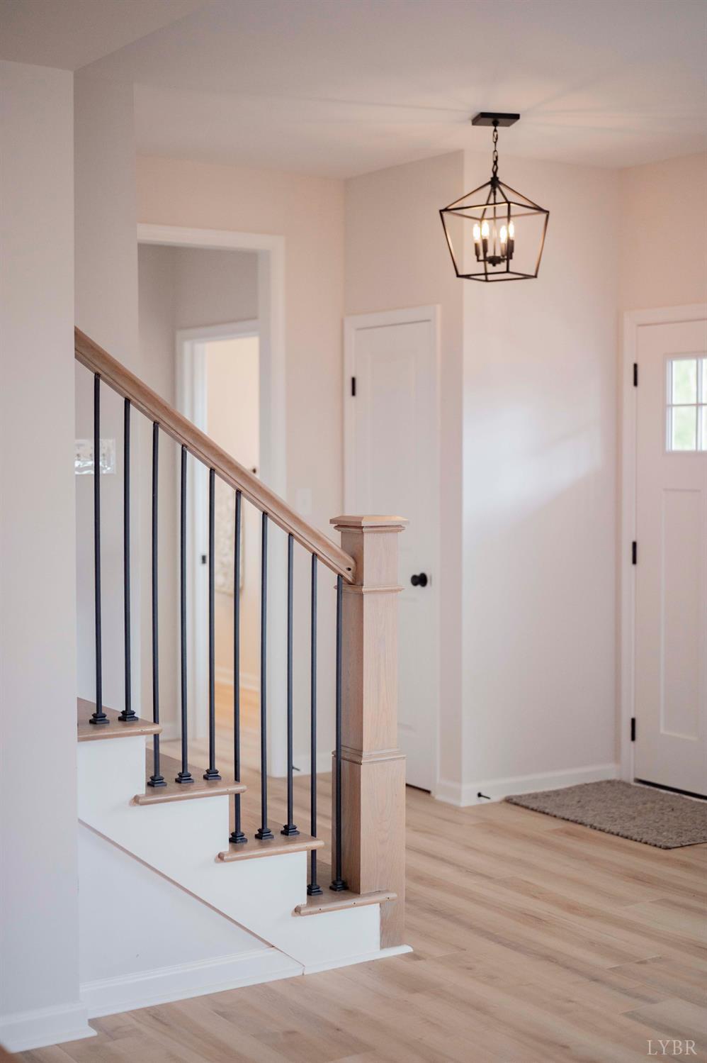 1833 Crockett Road Forest, VA 24551 - Photo 31 of 32 a view of a room with wooden floor and staircase