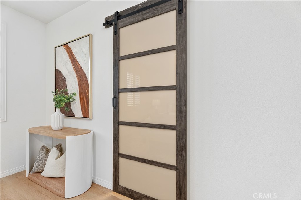 38 Pathway Irvine, CA 92618 - Photo 18 of 39 Privacy barn door to the primary bathroom