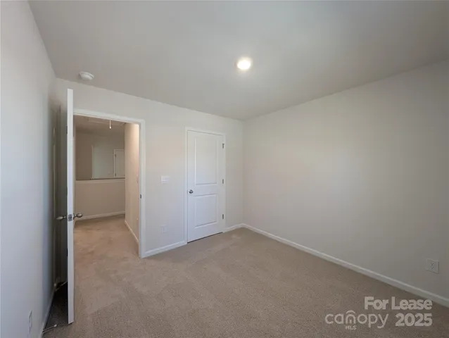 an empty room with an entryway