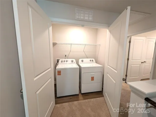 a view of empty room with racks