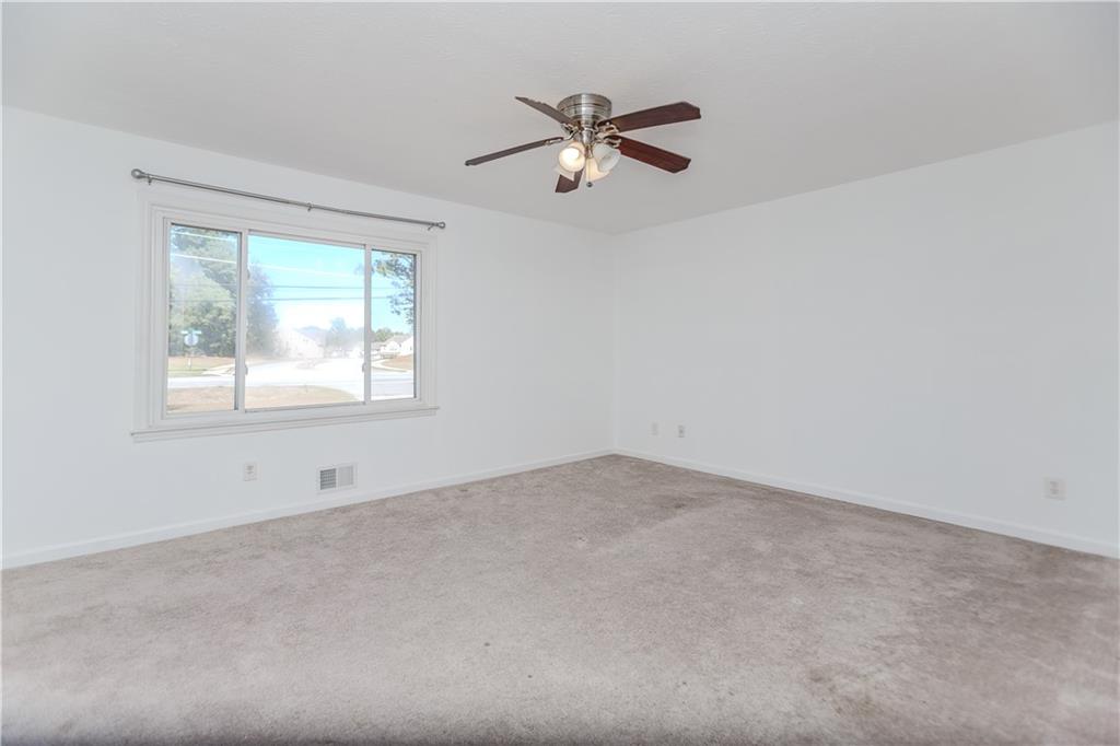 3408 Hamilton Mill Road Buford, GA 30519 - Photo 11 of 32 a view of an empty room with a window