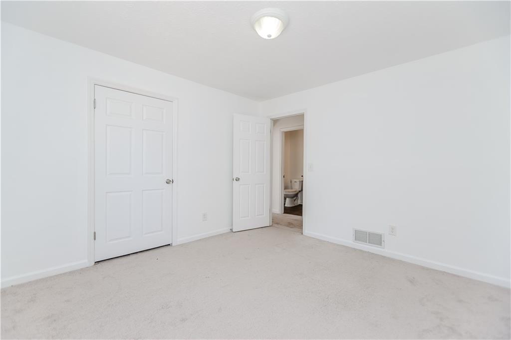 3408 Hamilton Mill Road Buford, GA 30519 - Photo 20 of 32 an empty room with an entryway