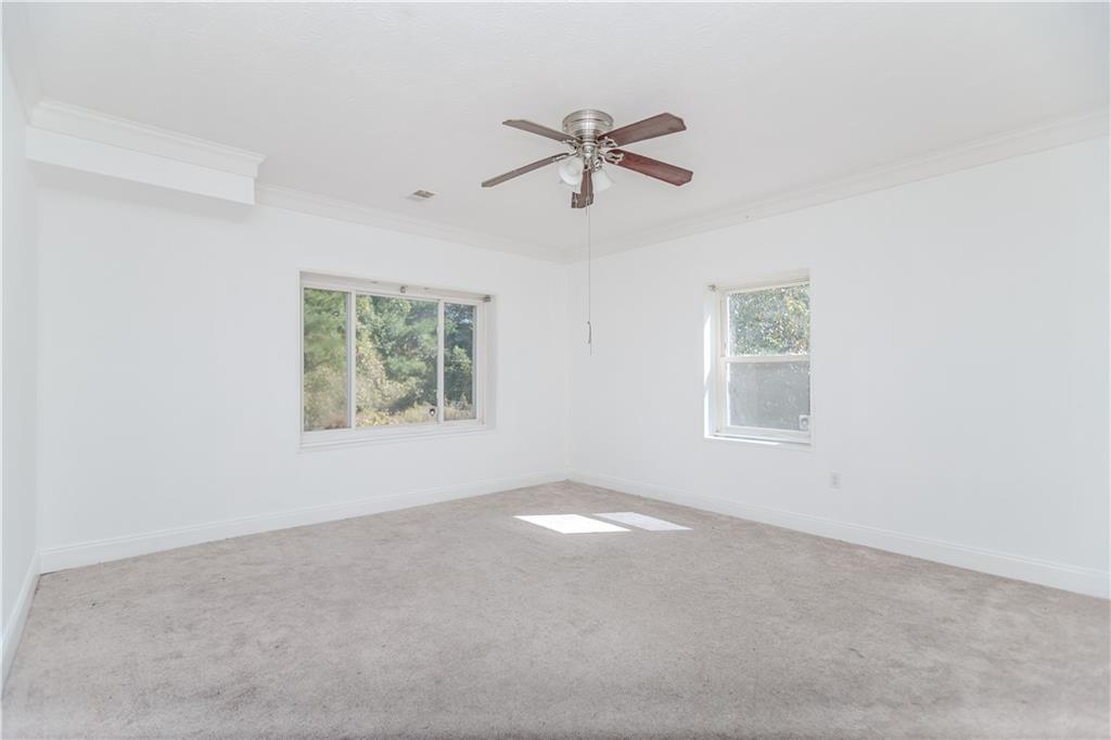 3408 Hamilton Mill Road Buford, GA 30519 - Photo 23 of 32 a view of an empty room with a window