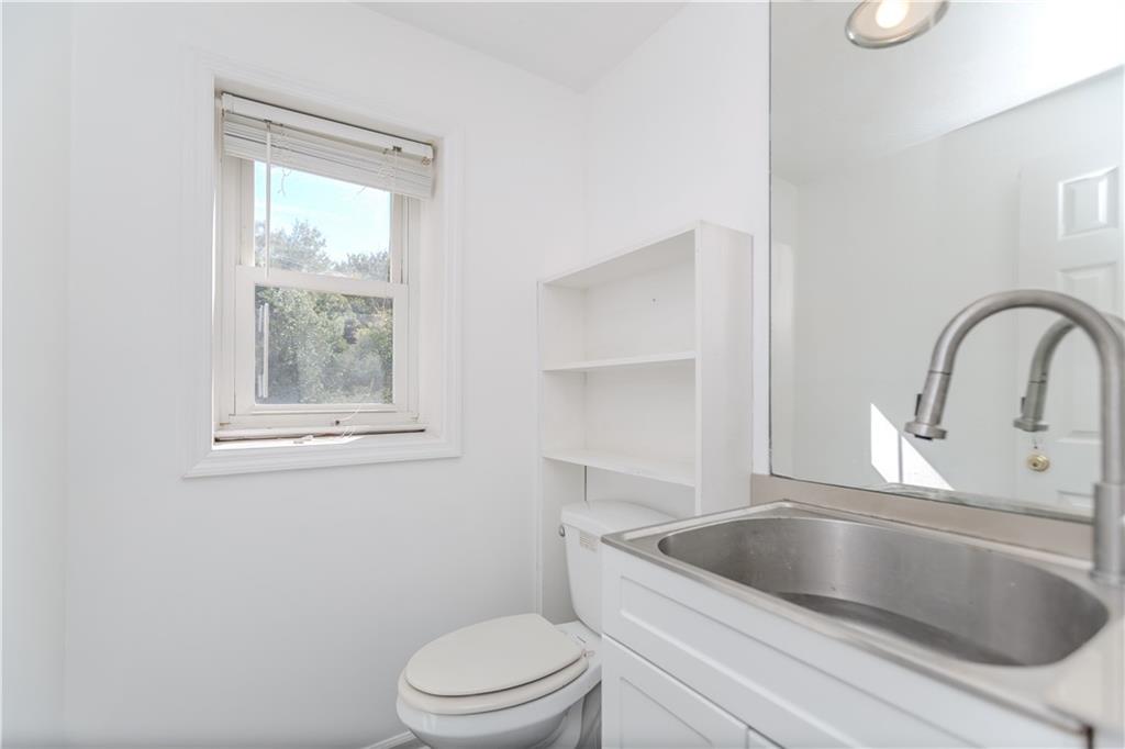 3408 Hamilton Mill Road Buford, GA 30519 - Photo 26 of 32 a view of a sink and a toilet