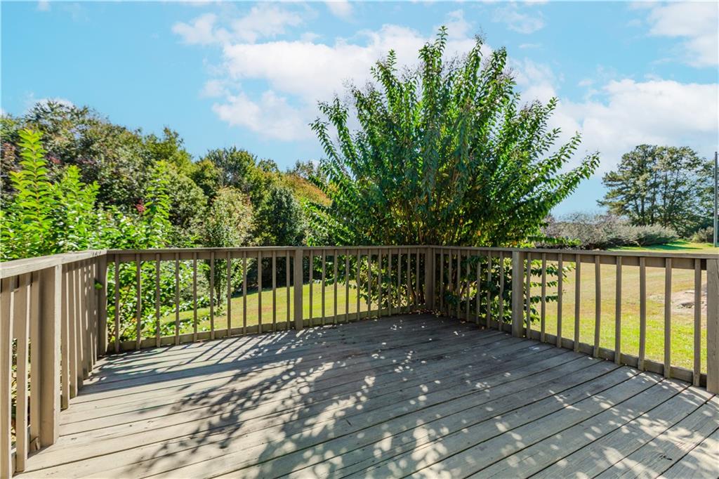 3408 Hamilton Mill Road Buford, GA 30519 - Photo 28 of 32 a balcony with trees in front of it
