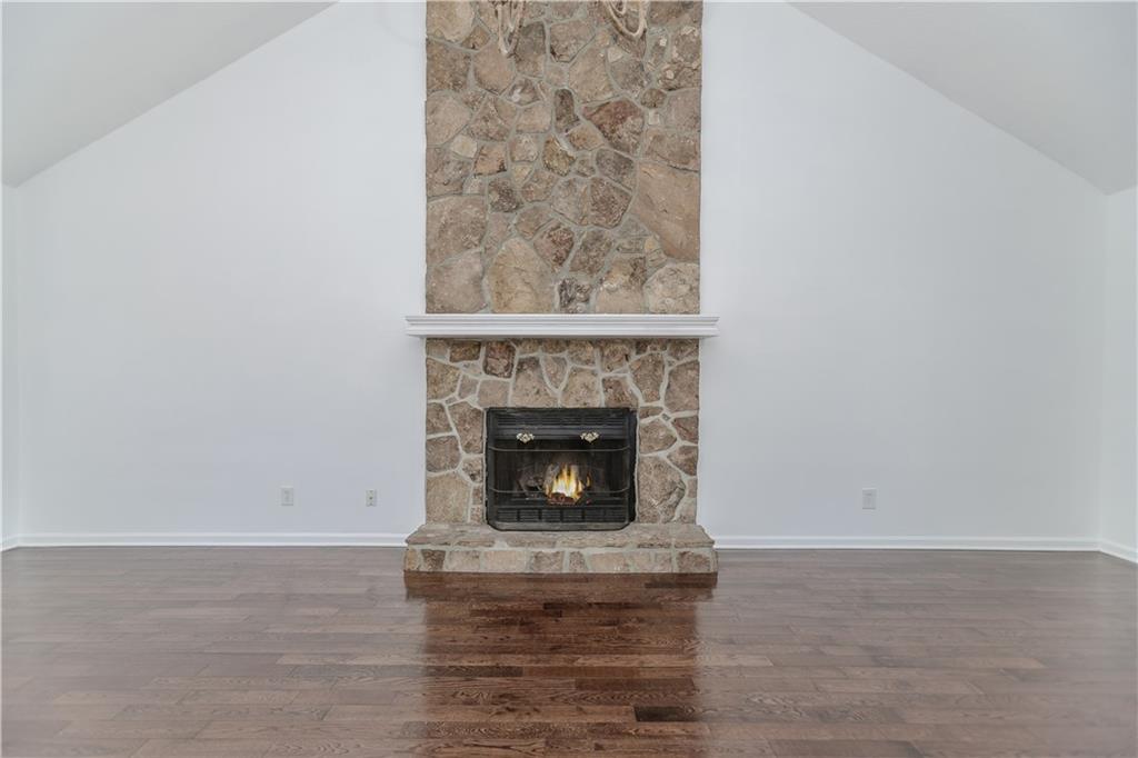 3408 Hamilton Mill Road Buford, GA 30519 - Photo 4 of 32 a living room with a fireplace