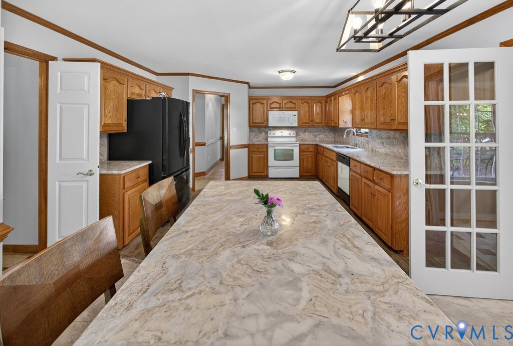 173 Covenant Way Bumpass, VA 23024 - Photo 11 of 63 The kitchen features extensive counter space, wood