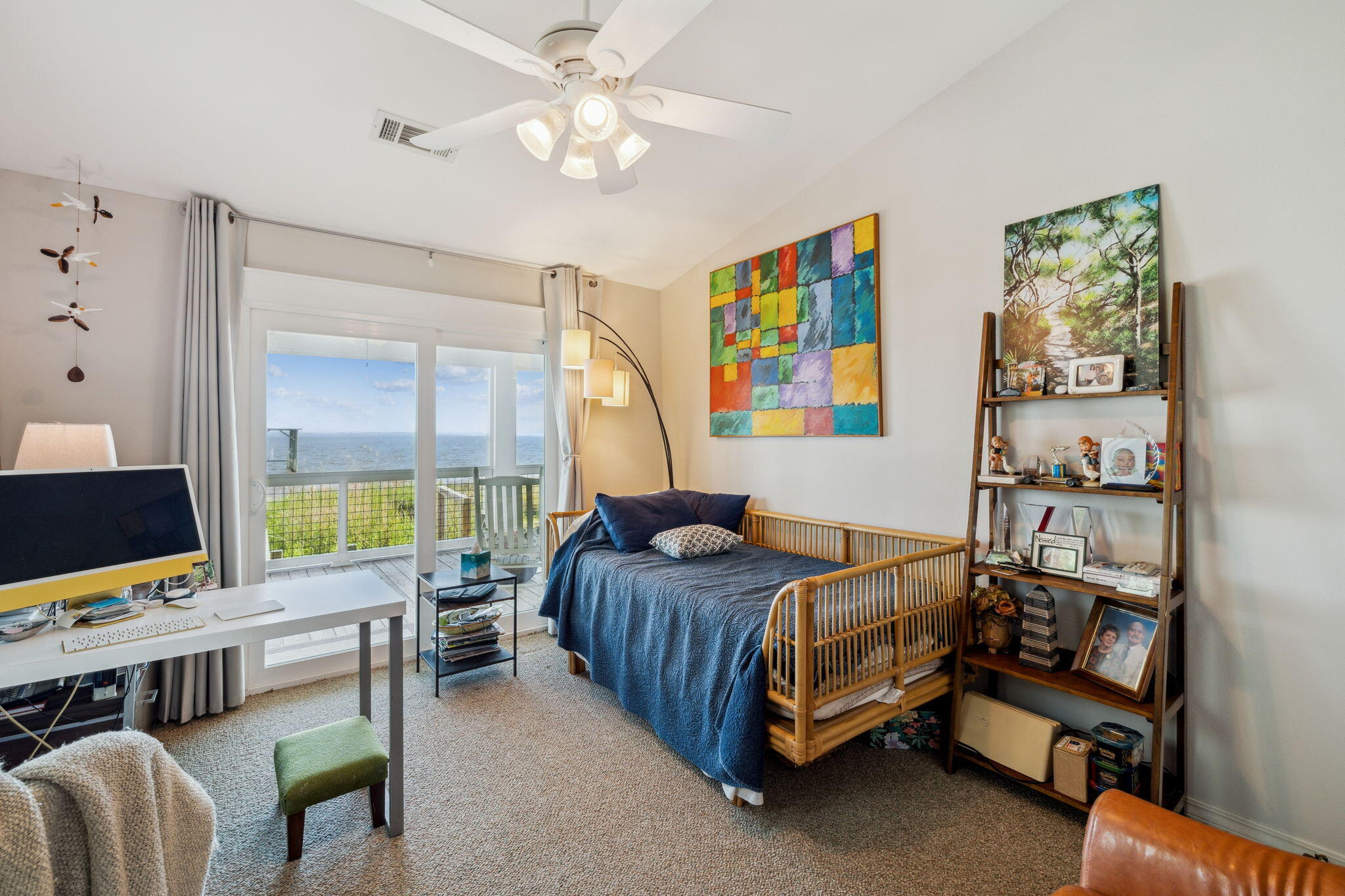 227 Shady Lane Freeport, FL 32439 - Photo 19 of 32 a bedroom with a bed and a window