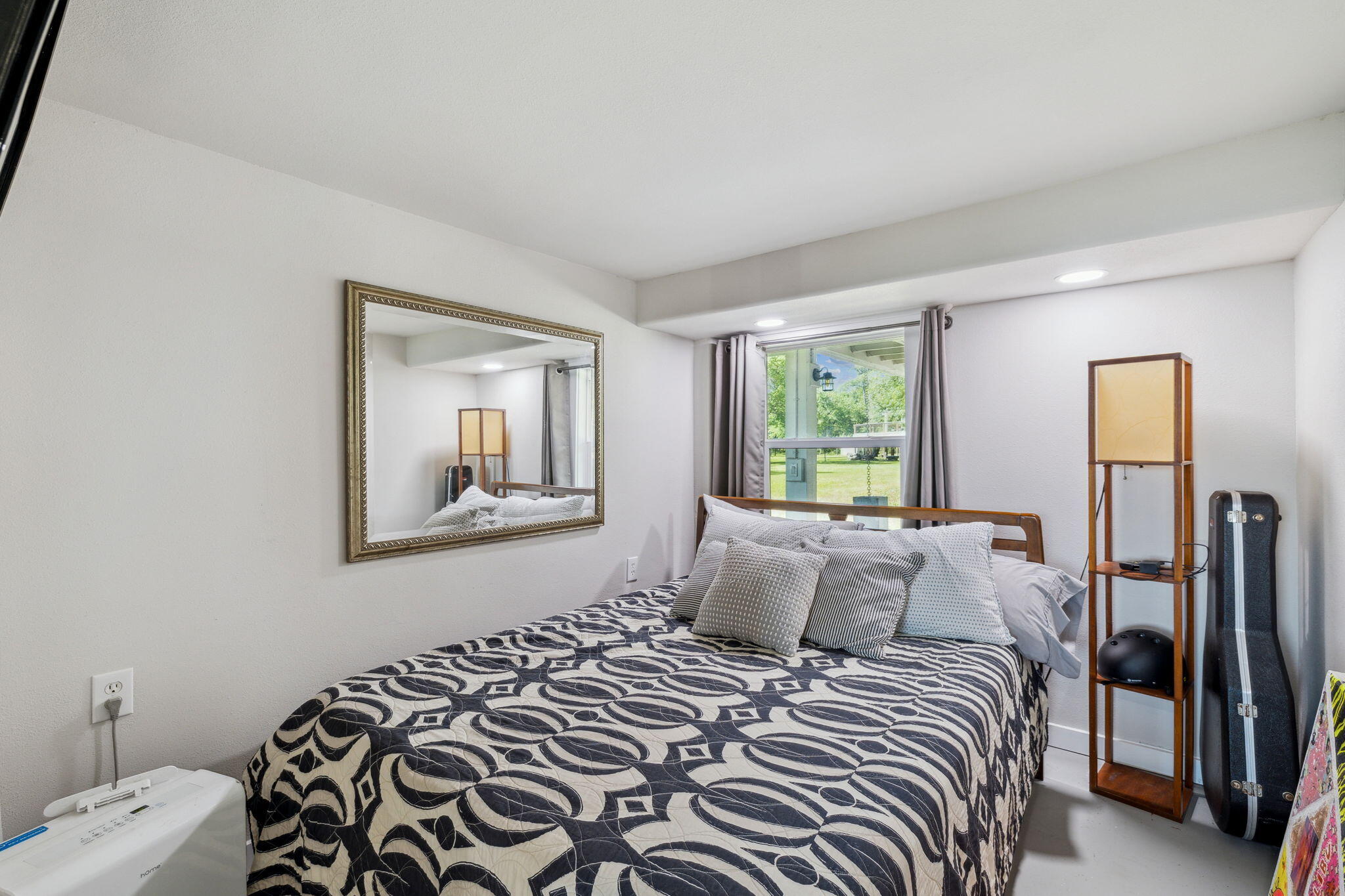 227 Shady Lane Freeport, FL 32439 - Photo 20 of 32 a bedroom with a bed and a window