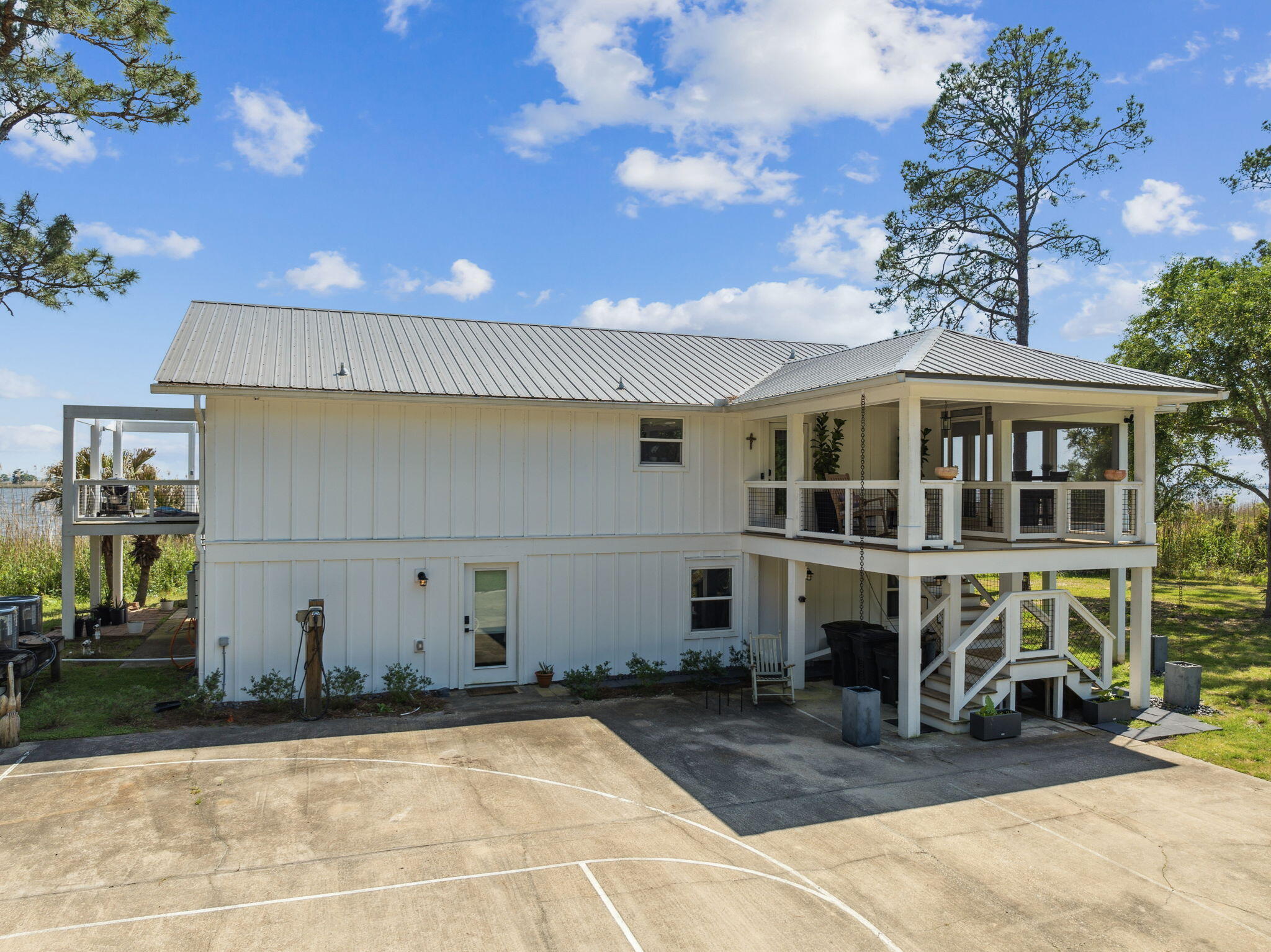 227 Shady Lane Freeport, FL 32439 - Photo 2 of 32 a front view of a building with entryway