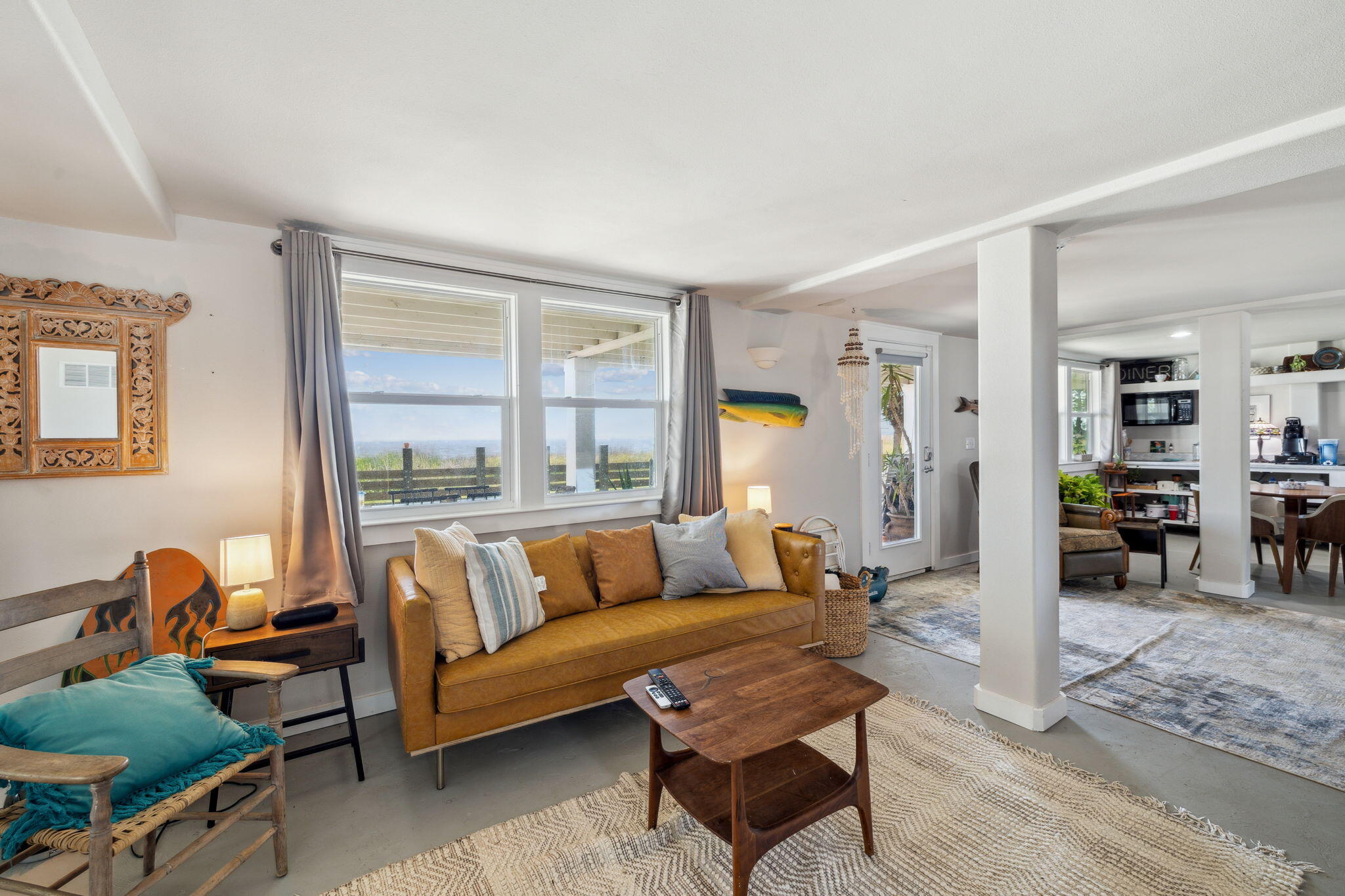 227 Shady Lane Freeport, FL 32439 - Photo 23 of 32 a living room with furniture and a large window