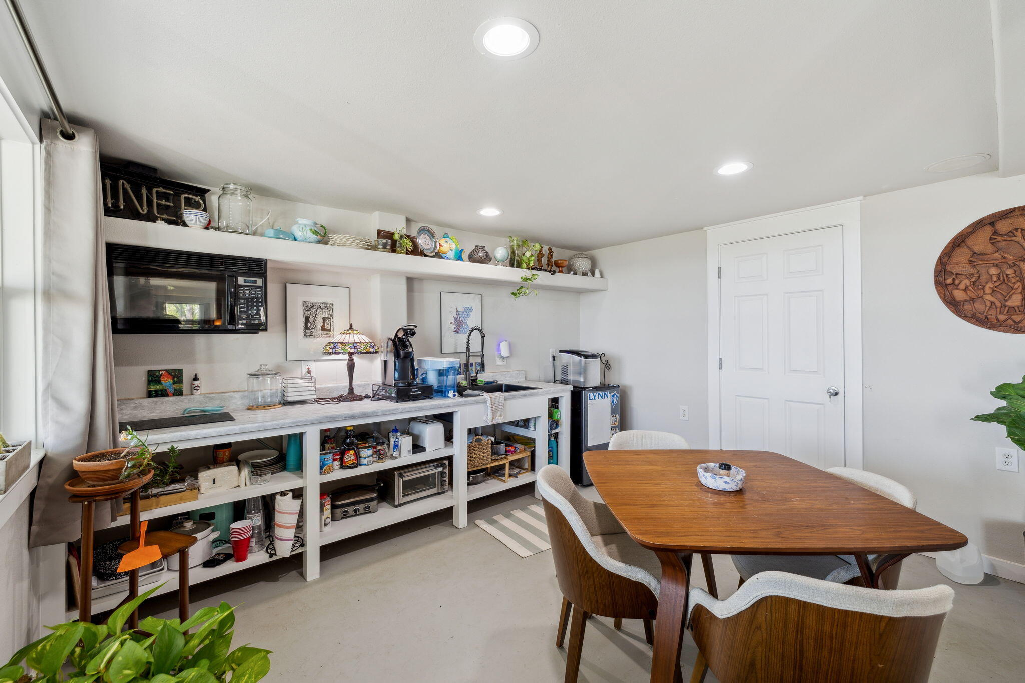 227 Shady Lane Freeport, FL 32439 - Photo 25 of 32 a room with furniture a flat screen tv and a table