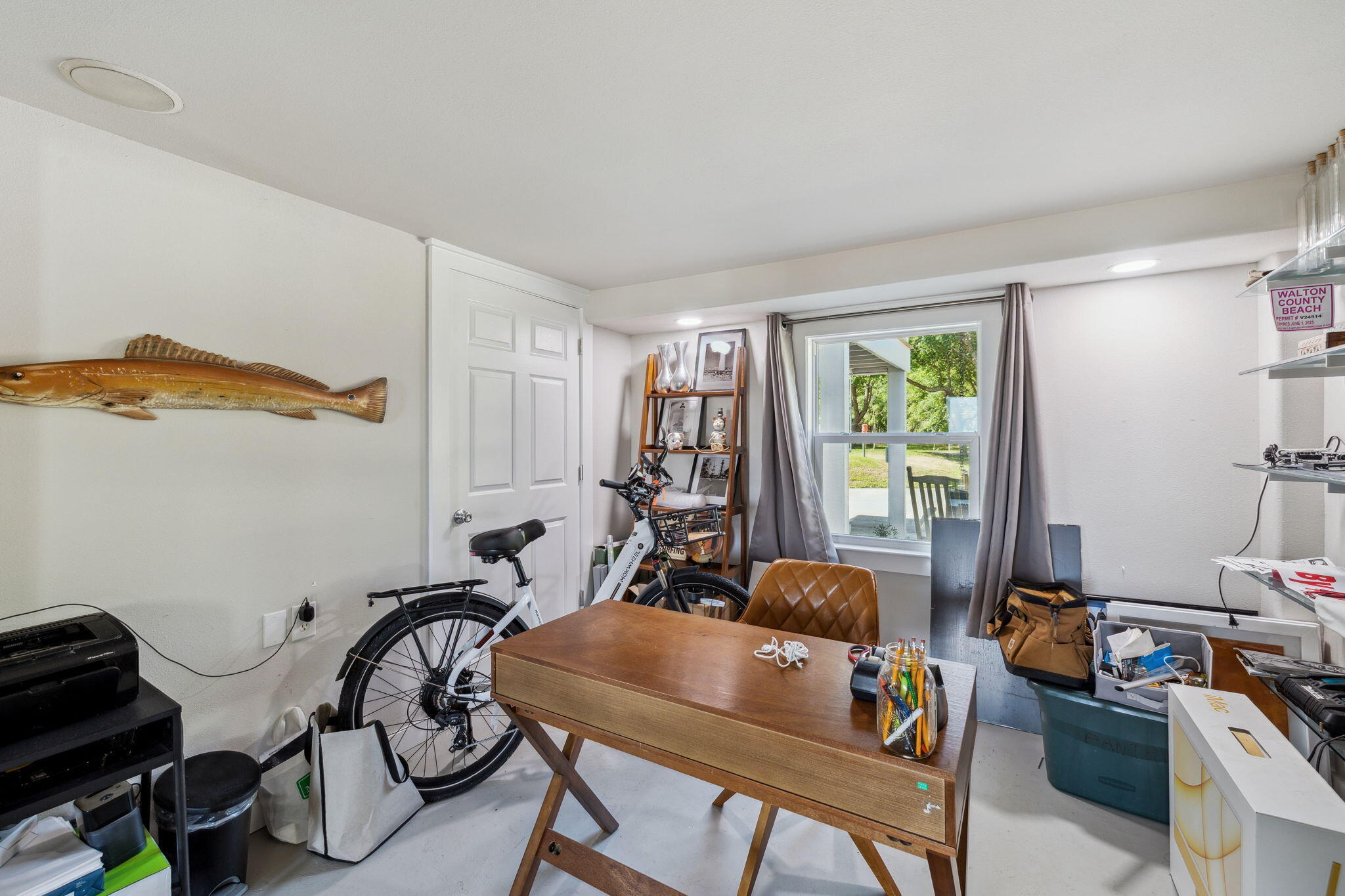 227 Shady Lane Freeport, FL 32439 - Photo 26 of 32 a view of a workspace with furniture and a window