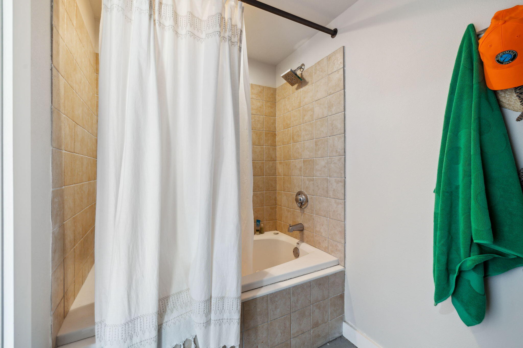 227 Shady Lane Freeport, FL 32439 - Photo 29 of 32 a bathroom with a shower curtain and a sink