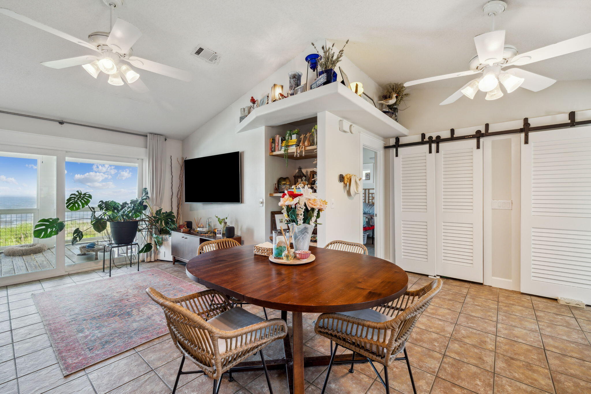 227 Shady Lane Freeport, FL 32439 - Photo 10 of 32 a view of a dining room with furniture and wooden floor