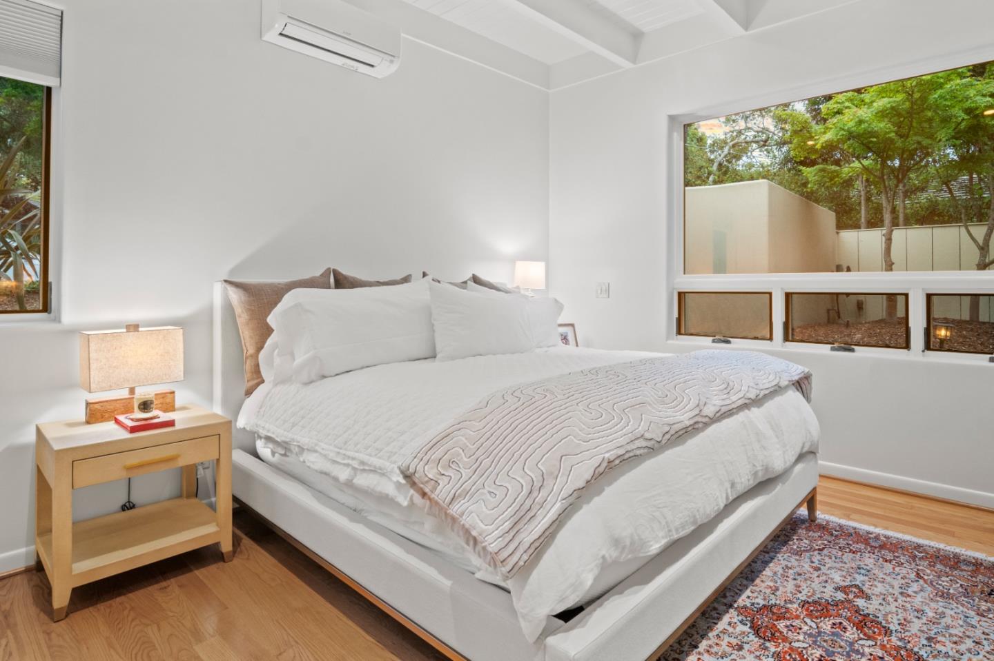 0 Lobos Street Carmel, CA 93923 - Photo 26 of 54 a bedroom with a bed and a window