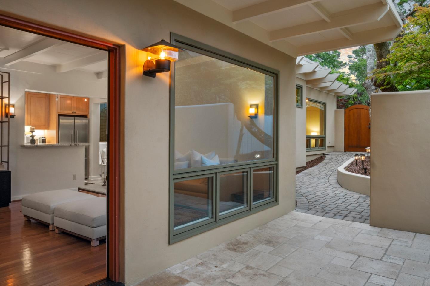 0 Lobos Street Carmel, CA 93923 - Photo 3 of 54 a en suite bathroom with a granite countertop sink and a mirror