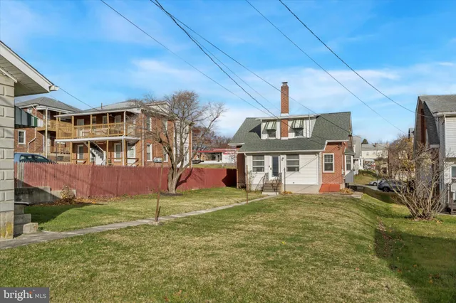 a view of a house with a big yard