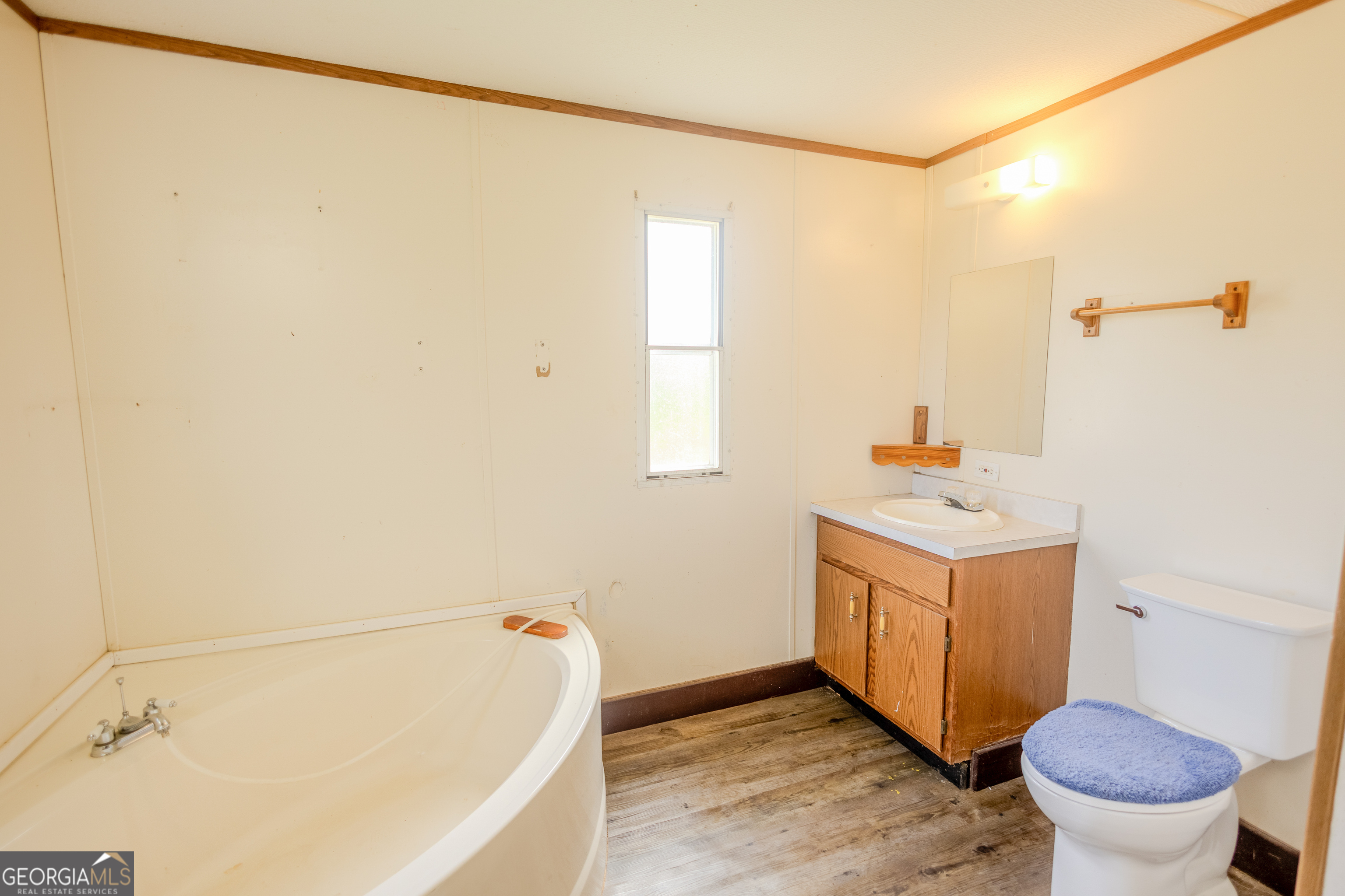 35 Brooks Street Canon, GA 30520 - Photo 13 of 25 a bathroom with a sink and a toilet