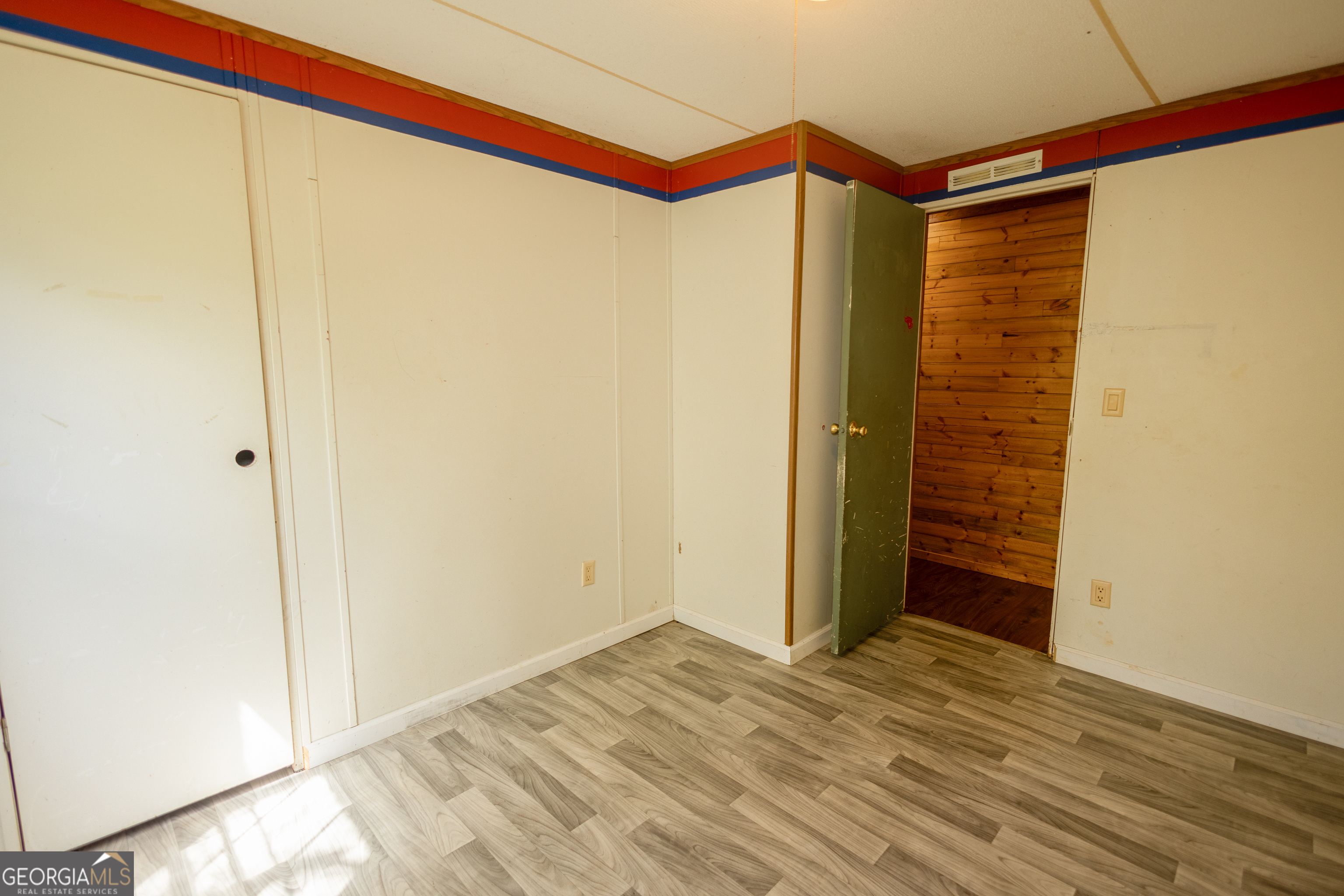 35 Brooks Street Canon, GA 30520 - Photo 17 of 25 a view of a room with wooden floor and bathroom