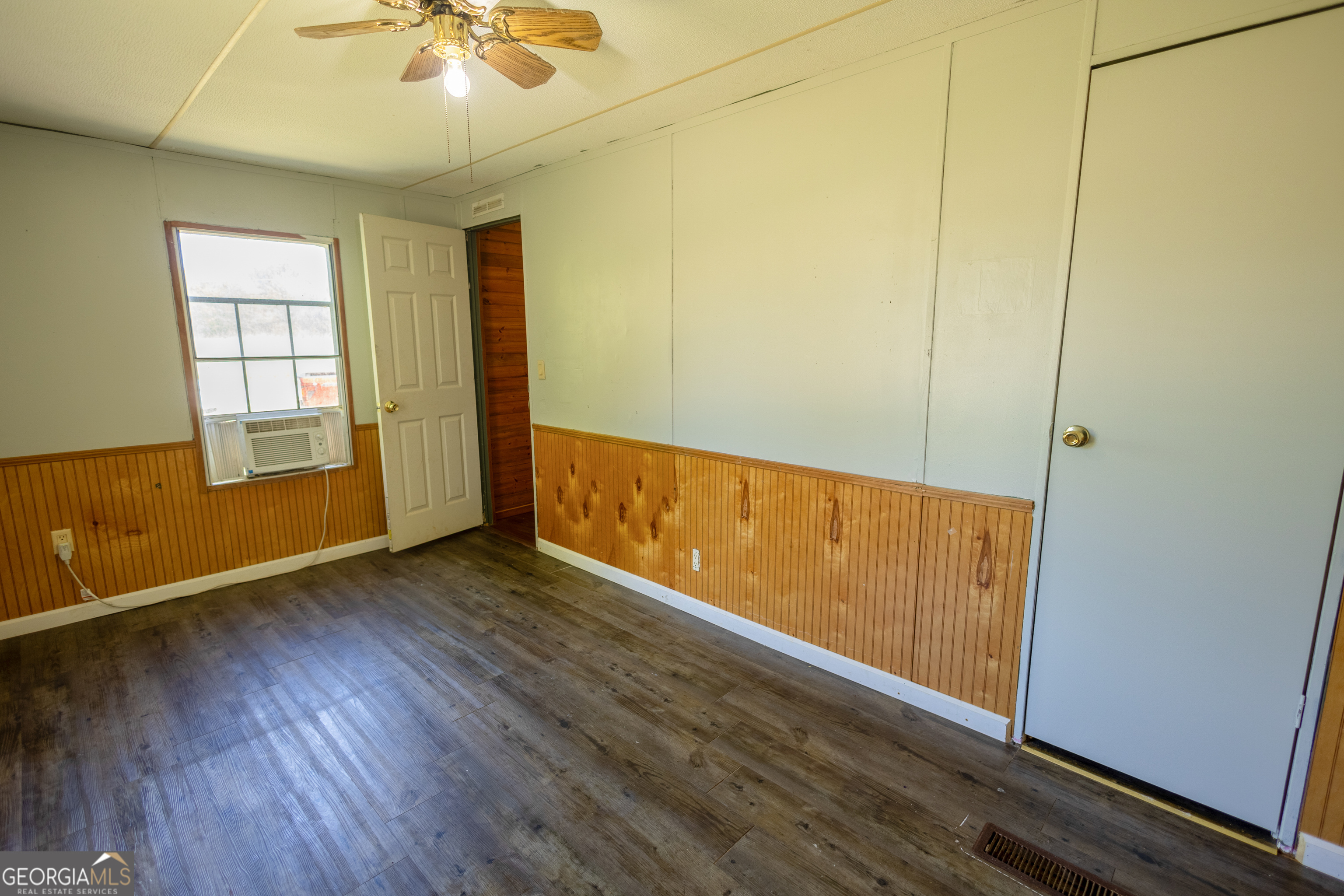 35 Brooks Street Canon, GA 30520 - Photo 19 of 25 wooden floor in an empty room with a window