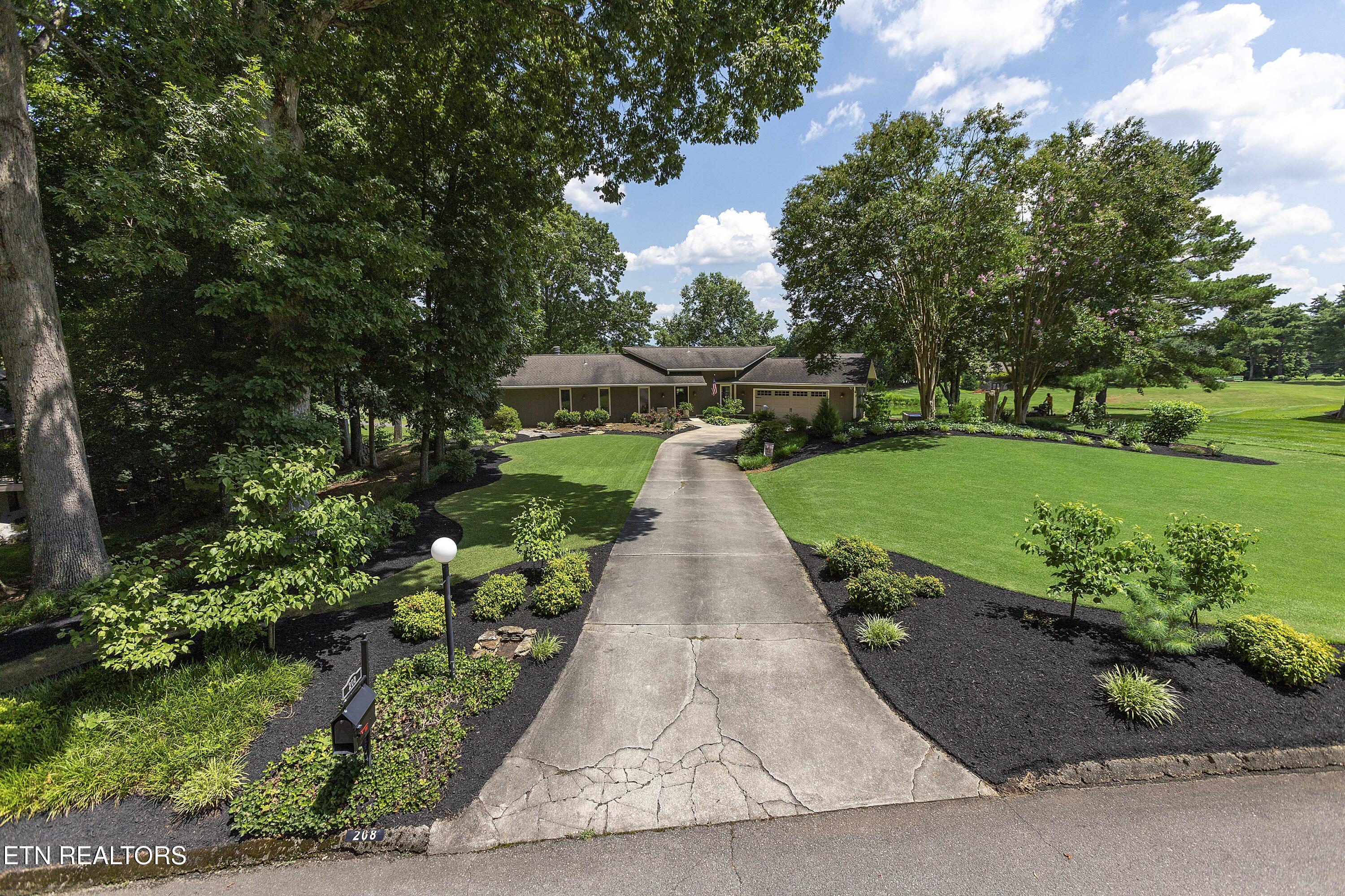 208 Baltusrol Road Knoxville, TN 37934 - Photo 36 of 38 Lush, Manicured Lawn