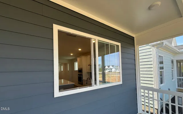 a view of a glass door and a window