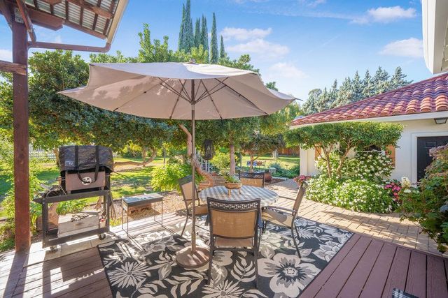 a kitchen with a refrigerator and countertop