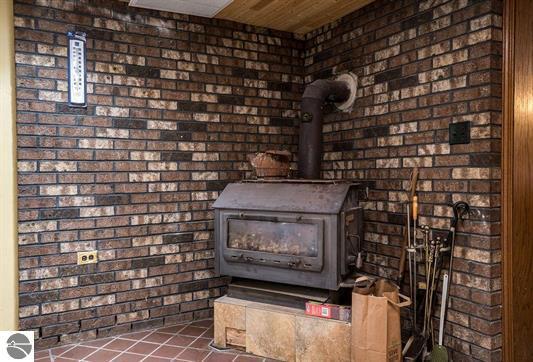 3175 Strand Road Muskegon, MI 49445 - Photo 11 of 58 Fireplace/Stove (Lower Level)