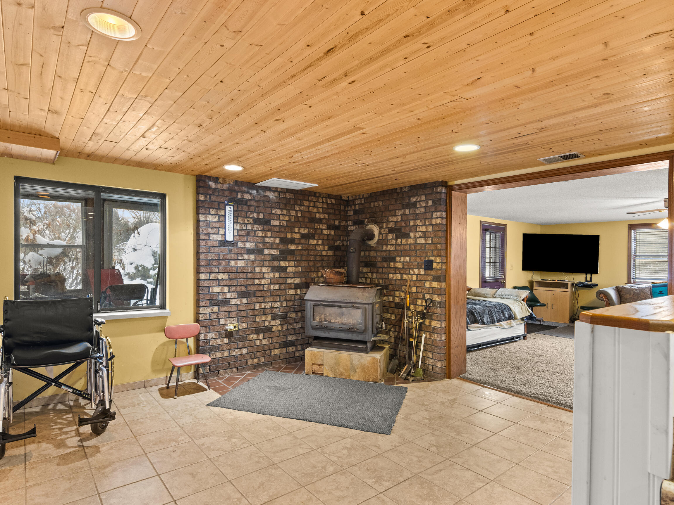 3175 Strand Road Muskegon, MI 49445 - Photo 12 of 58 Lower Level Fireplace