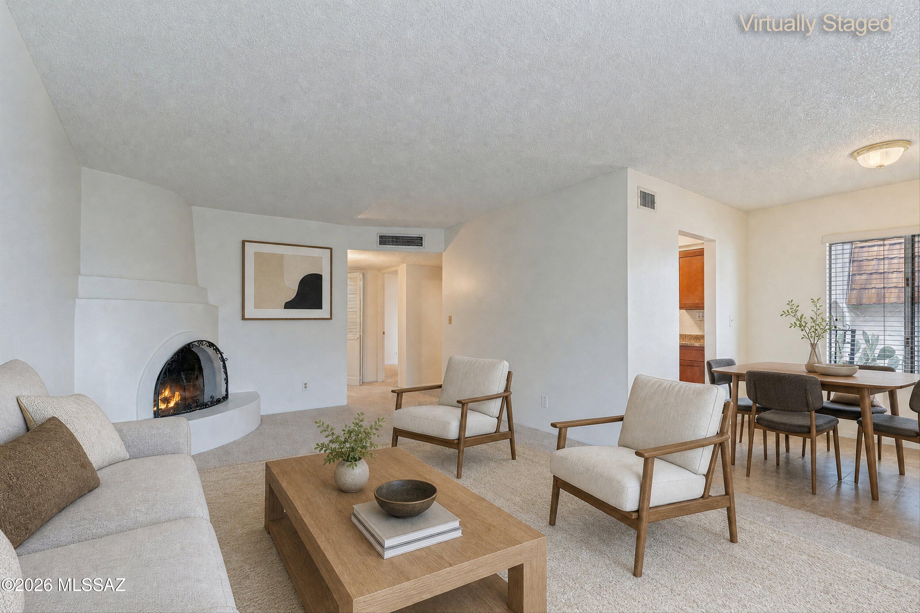 660 East River Road, Unit J Tucson, AZ 85704 - Photo 6 of 27 Living and Dining with Furniture