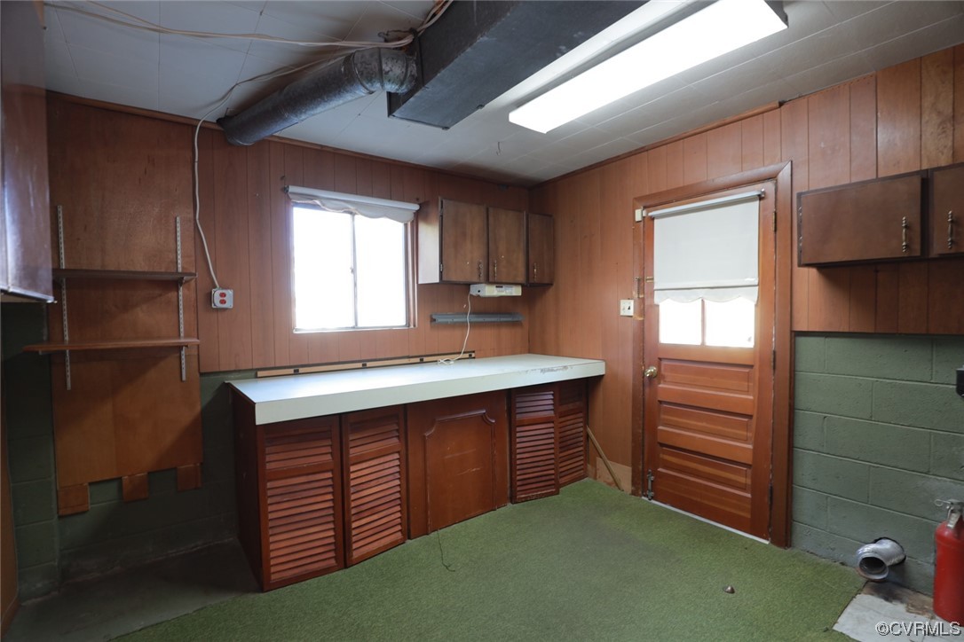 6424 Commander Road Richmond, VA 23224 - Photo 36 of 46 a kitchen with a sink cabinets and window