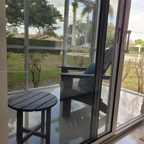 a view of a wooden bench in balcony