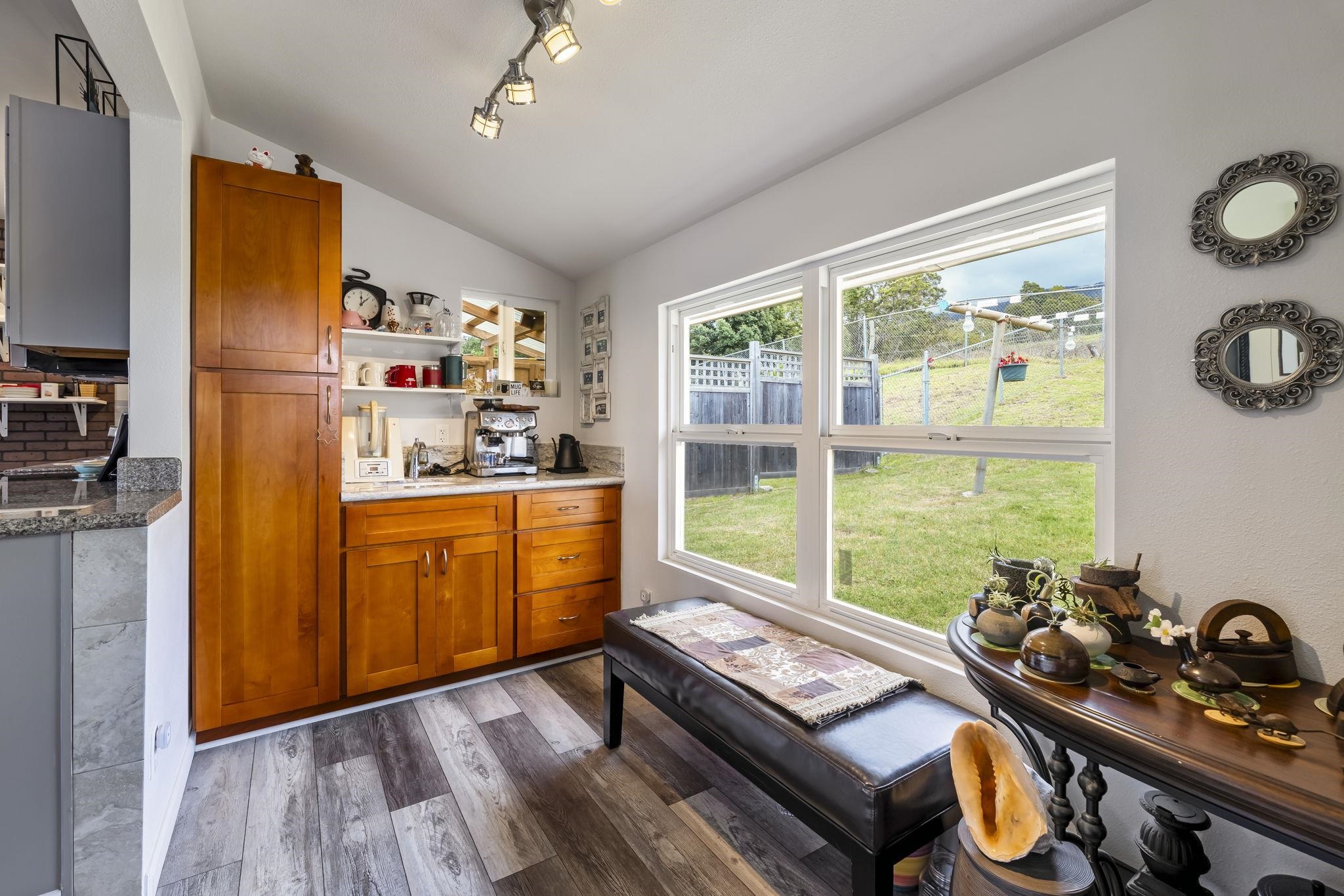5435 Lower Kula Road Kula, HI 96790 - Photo 4 of 41 a kitchen with sink refrigerator and window