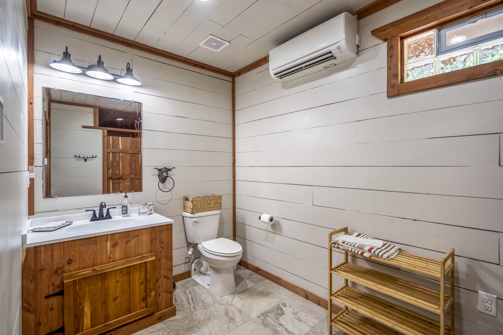 1320 County Road 2112 Rusk, TX 75785 - Photo 24 of 50 a bathroom with a sink and a mirror