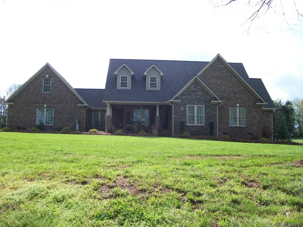 1707 Requa Road Cherryville, NC 28021 - Photo 2 of 24 a house view with a garden space