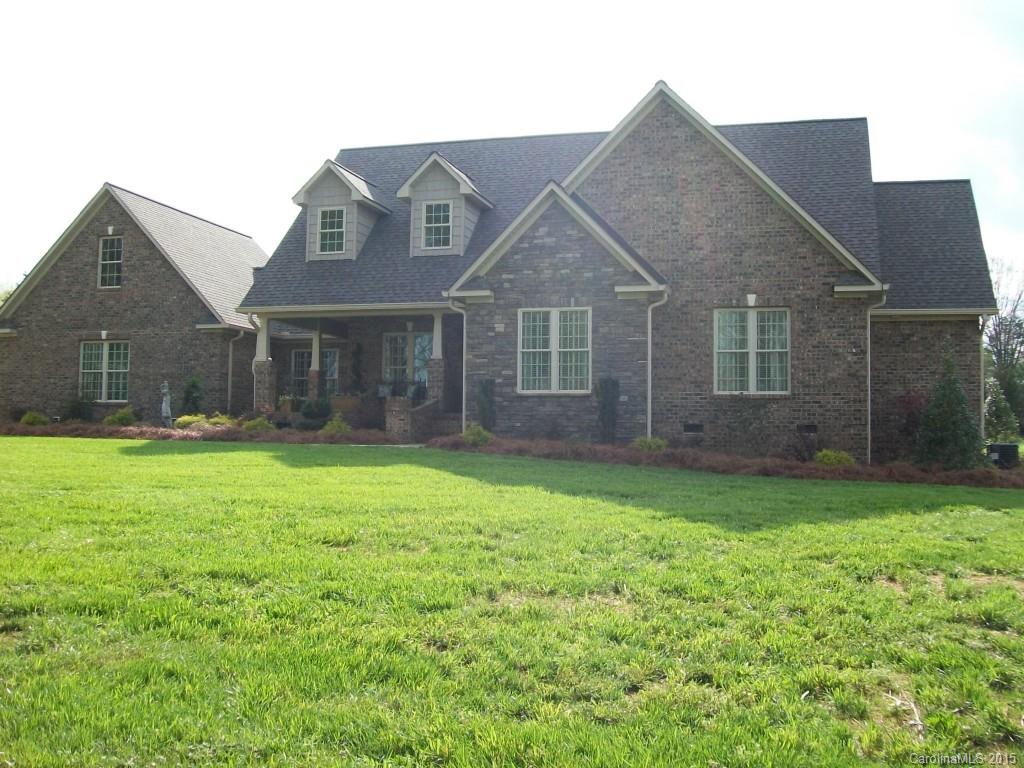 1707 Requa Road Cherryville, NC 28021 - Photo 3 of 24 a front view of a house with a yard