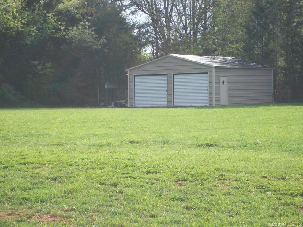 1707 Requa Road Cherryville, NC 28021 - Photo 23 of 24 a house with a yard