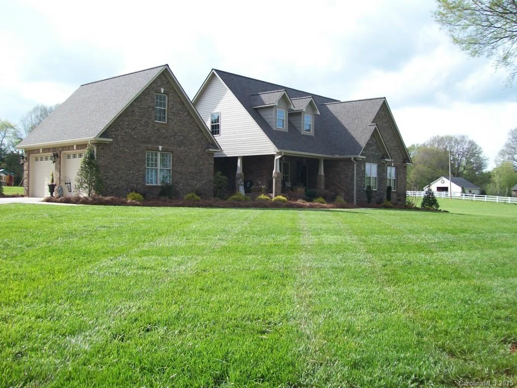 1707 Requa Road Cherryville, NC 28021 - Photo 5 of 24 a front view of house with yard and green space