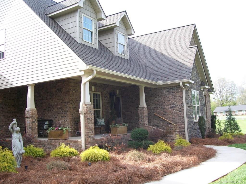 1707 Requa Road Cherryville, NC 28021 - Photo 6 of 24 a front view of a house with garden