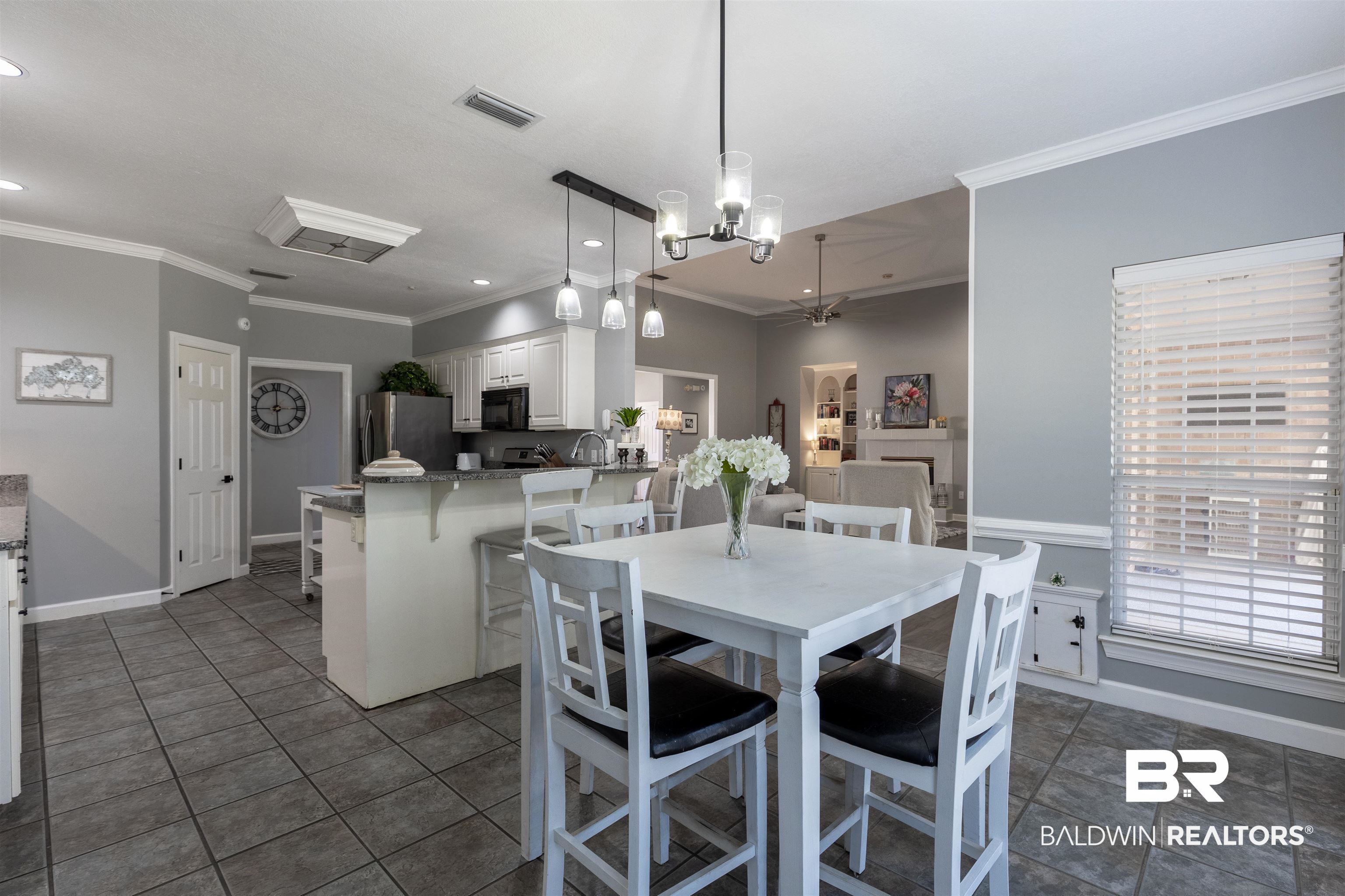 6436 Cherry Ridge Court West Mobile, AL 36695 - Photo 16 of 26 Dining space with crown molding, a chandelier, baseboards, visible vents, and recessed lighting
