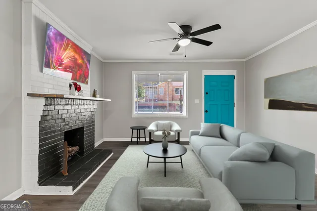 a living room with furniture and a fireplace